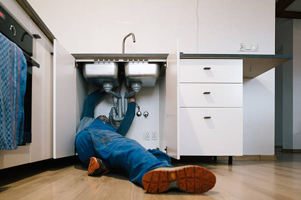 Professional Emergency Plumber technician working in Mount Washington, KY